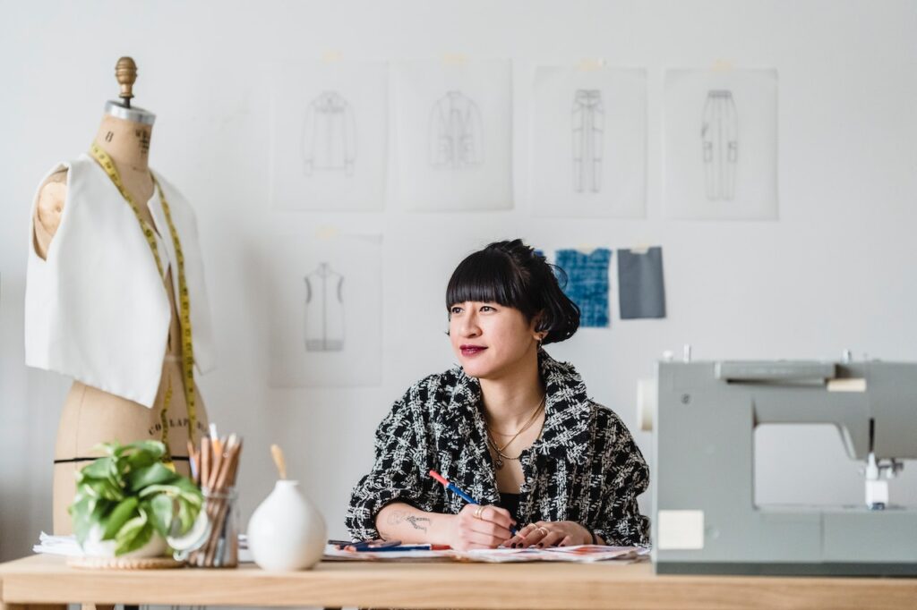 decorative image of a woman in a textile design studio